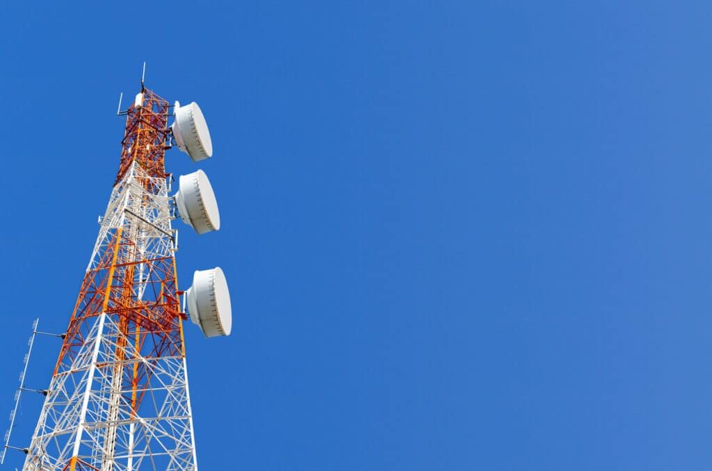 telecommunication tower on blue sky background – SiteBid