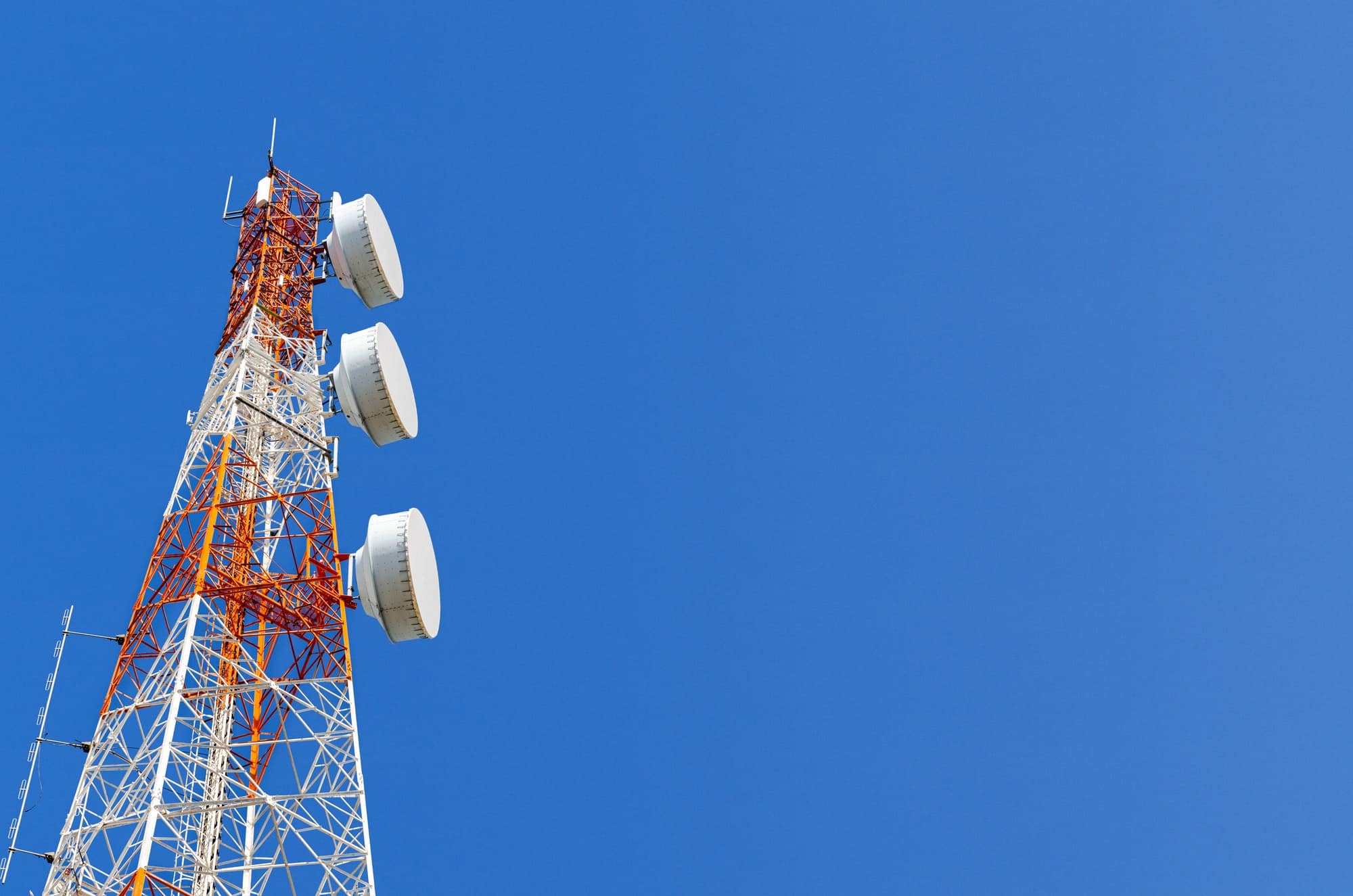 telecommunication tower on blue sky background – SiteBid