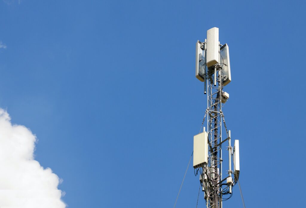 Communication antenna tower with blue sky,Telecoms technology. Mobile phone base station