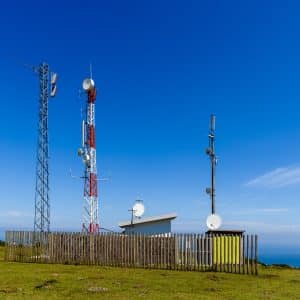 Telecommunication And Telephone Antenna In Green Landscape
