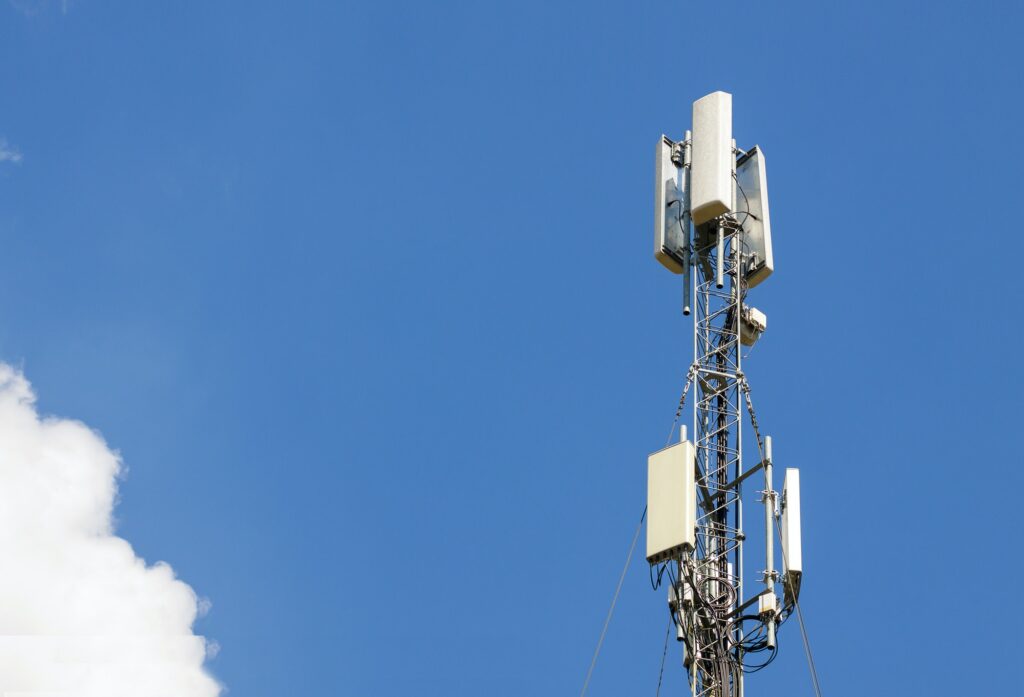 Communication Antenna Tower With Blue Sky,Telecoms Technology. Mobile Phone Base Station